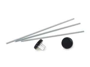 Four metal bolts with black and clear plastic caps, motorcycle maintenance parts, on white background.