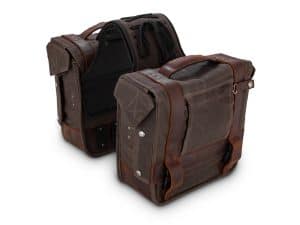 Stylish leather and canvas motorcycle saddlebags for Revelry Motorcycles, perfect for touring enthusiasts.