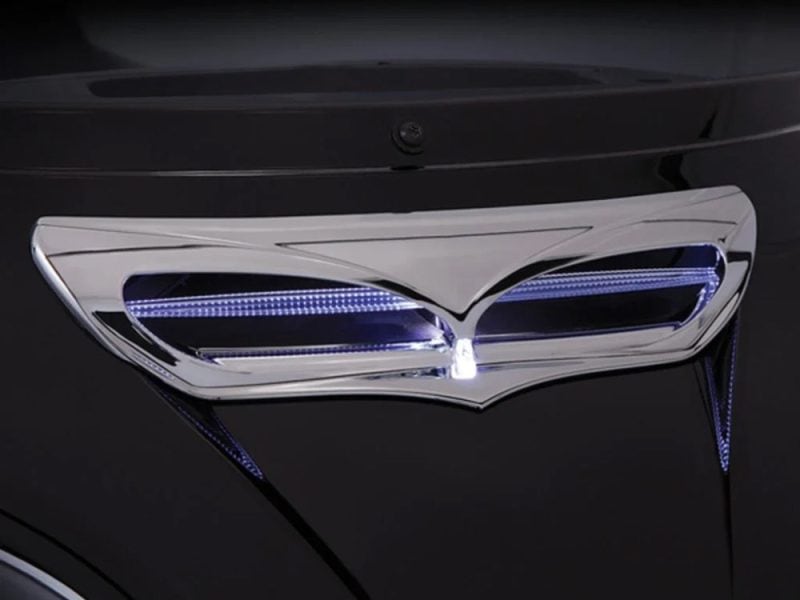 Sleek modern car headlight with LED accents, part of the luxury vehicle range.