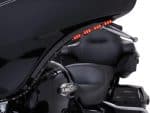 Motorcycle rear lighting with LED brake light strip on black touring Harley Davidson motorcycle.