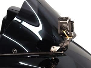 High-performance motorcycle dashboard with electronic controls and sleek design, perfect for motorcycle enthusiasts.