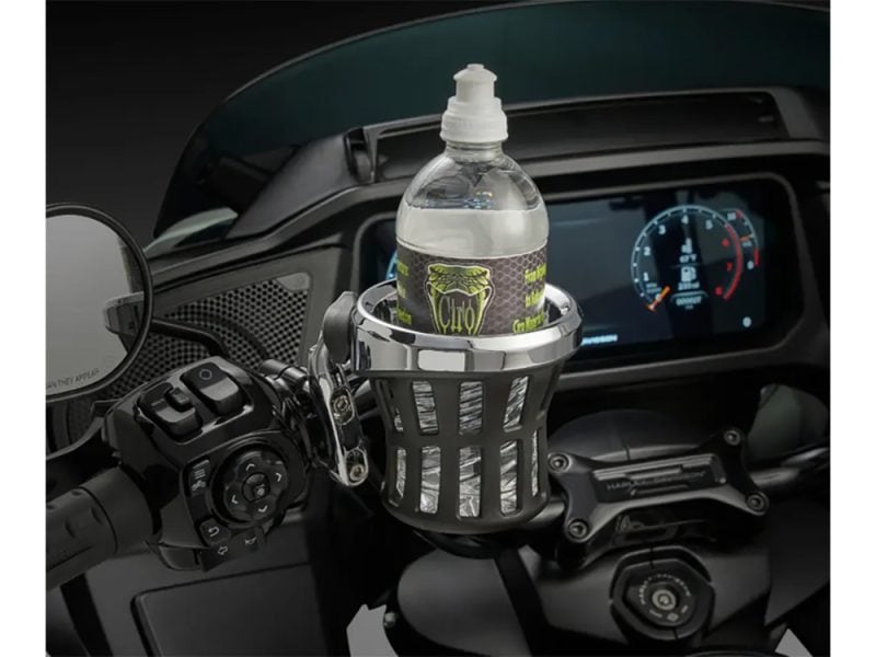Water bottle holder on motorcycle dashboard, ideal for motorcycle accessories and riding convenience.