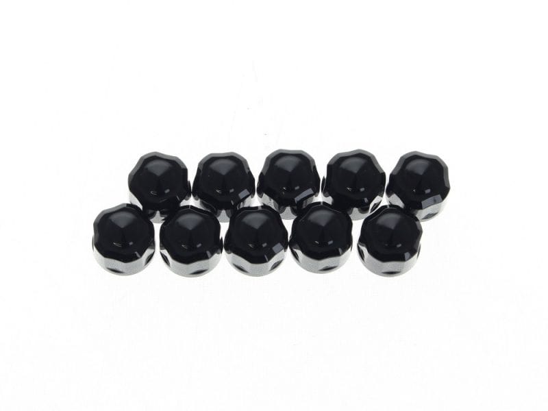 Black motorcycle bar end weights for Harley Davidson and custom bikes, enhancing ride comfort and stability.