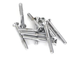 Shiny metal bolts and screws for motorcycle repairs and accessories.