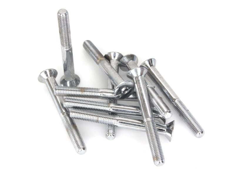 Shiny metal bolts and screws for motorcycle repairs and accessories.