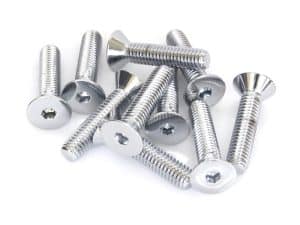 Shiny metal motorcycle screws for bike repair and maintenance.