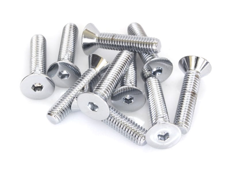 Shiny metal motorcycle screws for bike repair and maintenance.