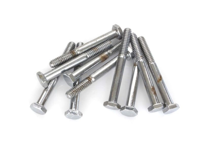 Assorted motorcycle hardware bolts for Revelry Motorcycles, high-quality stainless steel fasteners for custom bikes.