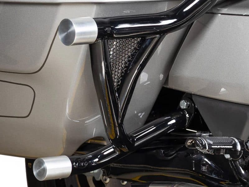 Sleek motorcycle frame with black and silver components for Harley Davidson bikes.