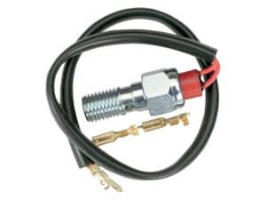 High-performance motorcycle spark plug with wiring for Revelry Motorcycles.