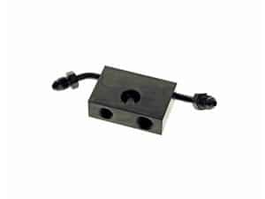 Aluminium motorcycle hydraulic brake reservoir mounting block with fittings.