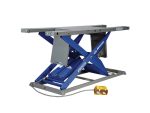 Heavy-duty motorcycle lift table for repair and maintenance at Revelry Motorcycles.