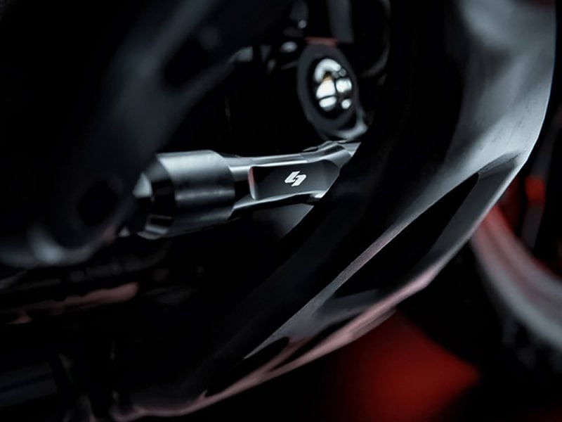 High-performance motorcycle handlebar with Revelry Cycles branding.