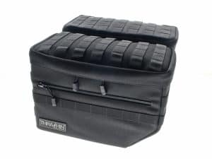 Black motorcycle gear bag with multiple compartments for Revelry Motorcycles riding accessories.