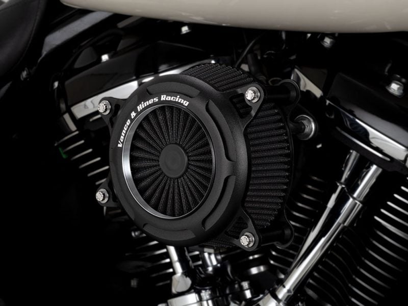 Vance & Hines Racing motorcycle engine part close-up, high-performance bike component.