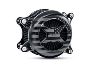 High-performance motorcycle clutch cover with black American flag design, rugged aluminium construction, ideal for motorcycle enthusiasts.