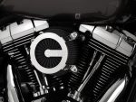 High-performance motorcycle engine showcasing sleek metallic details and custom air filter.