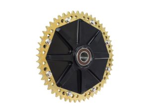 Aluminium motorcycle sprocket with black centre and gold teeth, premium cycling part for Revelry Motorcycles.