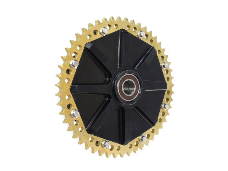 Cush Drive Chain Sprocket Kit with 51 Teeth Sprocket. Fits Touring 2009up. Aluminium motorcycle sprocket with black centre and gold teeth, premium cycling part for Revelry Motorcycles.
