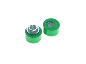 Green motorcycle suspension bushings with metal nuts for Revelry Motorcycles.