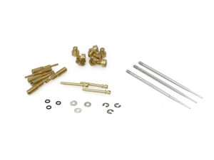 Gold motorcycle hardware kit with screws, spacers, and pins for custom bike builds.