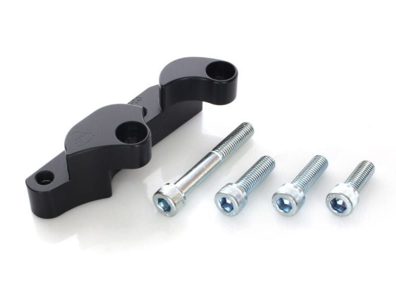 Aluminium motorcycle handlebar riser clamp with mounting bolts for Revelry Motorcycles.