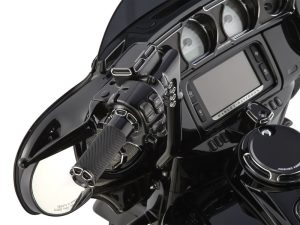 Harley-Davidson motorcycle dashboard with digital display and control panels.