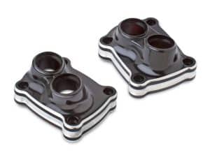 Black motorcycle cylinder head covers, essential engine components for Revelry Motorcycles.