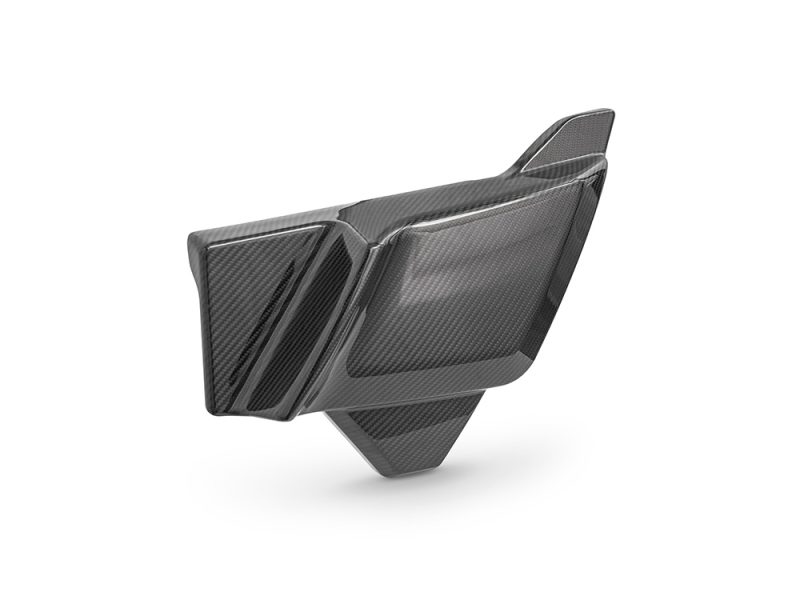 Carbon fibre motorcycle fairing part for Revelry Motorcycles, lightweight and aerodynamic design.