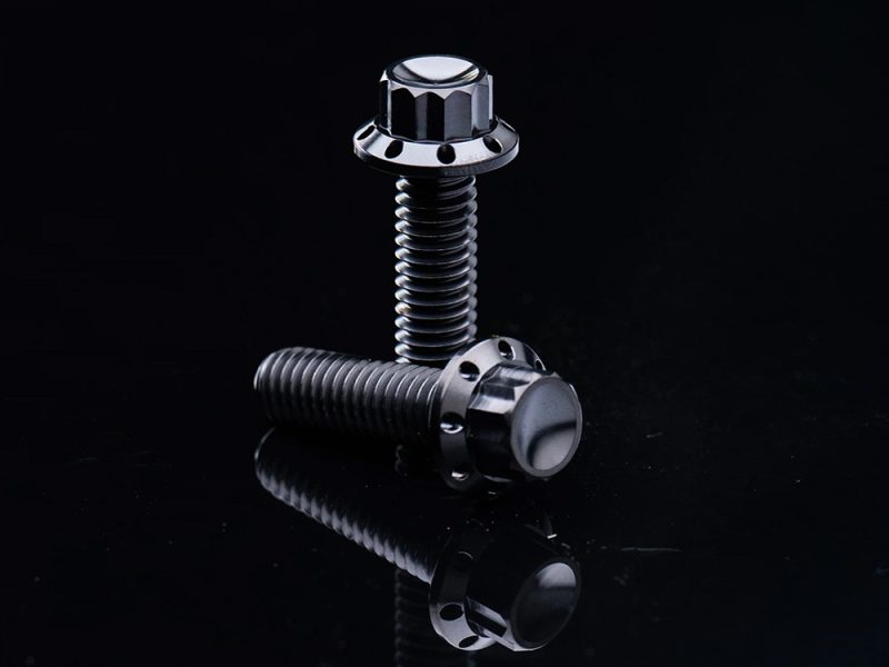Titanium 12-Point Transmission Side Cover Bolt Kit - Black. Fits Touring 2024up & Softail 2025up High-performance motorcycle bolts for custom bikes and repairs at Revelry Motorcycles.