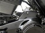 High-performance motorcycle engine components with sleek black and metallic finishes.
