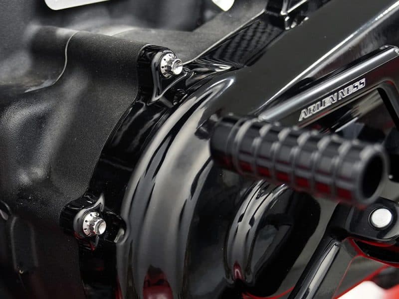 High-performance motorcycle engine close-up with black and silver details, perfect for enthusiasts and riders.