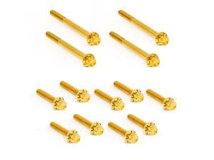 Gold motorcycle wheel axle screws for Revelry Motorcycles, precision aluminium parts.