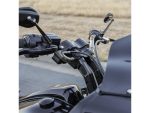 Sleek black motorcycle handlebar and dashboard detail at Revelry Motorcycles, highlighting custom motorcycle craftsmanship.