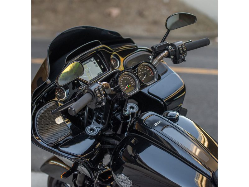 Sleek black Harley-Davidson touring motorcycle with advanced dashboard and handlebar controls.