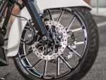 High-performance motorcycle front wheel with disc brake and alloy rim, ideal for custom and cruiser bikes.