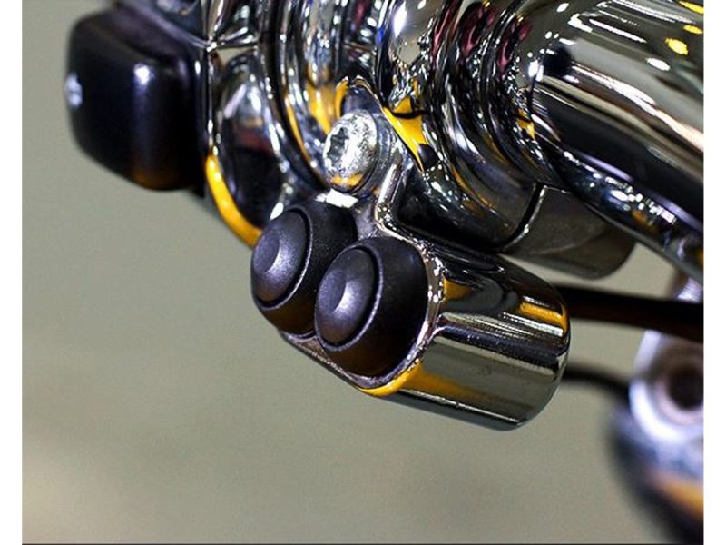 High-performance motorcycle exhaust pipes, chrome finish, for Harley Davidson and custom bikes.