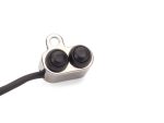 Wireless motorcycle earbud with sleek design for riding safety and audio experience.