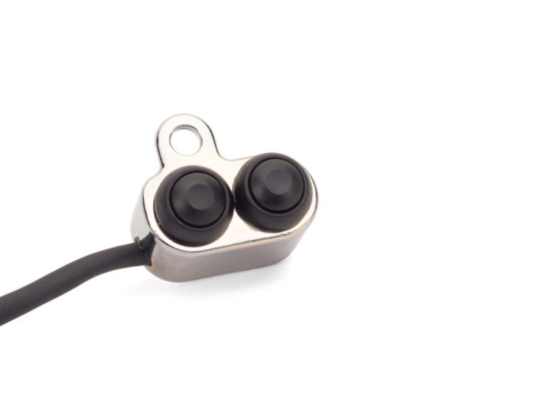 Wireless motorcycle earbud with sleek design for riding safety and audio experience.