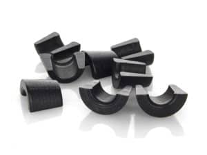 Black motorcycle engine piston clips for Harley Davidson and custom bikes.