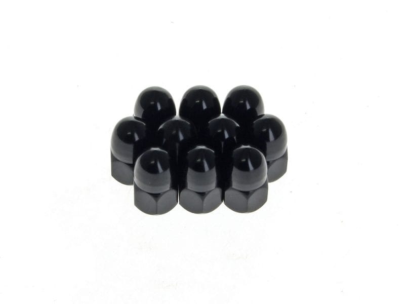 Black motorcycle wheel axle spacers for Revelry Motorcycles decorative accessories.