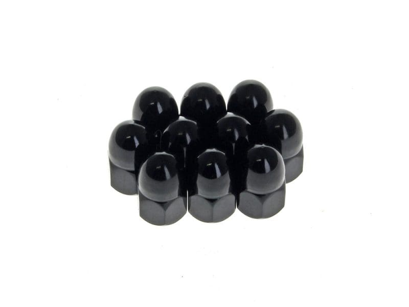 Black motorcycle swingarm pivot nuts for bike maintenance and repairs.