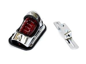 Chrome motorcycle tail light with mounting bracket for Revelry Motorcycles.