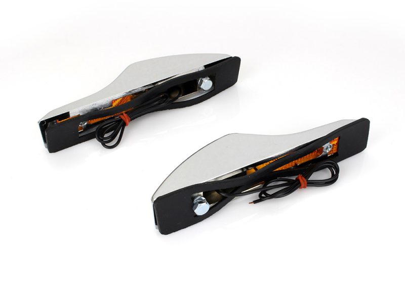 Bright motorcycle LED turn signals with black rubber mounting bases.