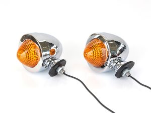 Chrome motorcycle turn signals with amber lenses for Revelry Motorcycles.