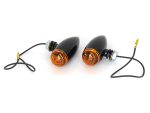 Amber motorcycle turn signals with black housing and wiring, compatible with Revelry Motorcycles.