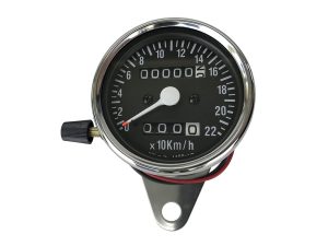 Bright chrome motorcycle speedometer with odometer for Revelry Motorcycles.