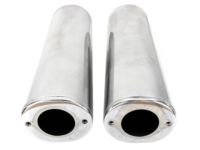 Polished motorcycle exhaust pipes for Revelry Motorcycles, high-quality custom bike parts.