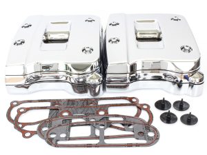 Shiny chrome motorcycle engine valve covers with gaskets and mounting hardware.