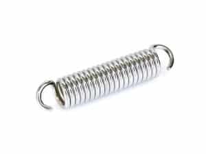 Shiny metal motorcycle suspension spring for Revelry Motorcycles.